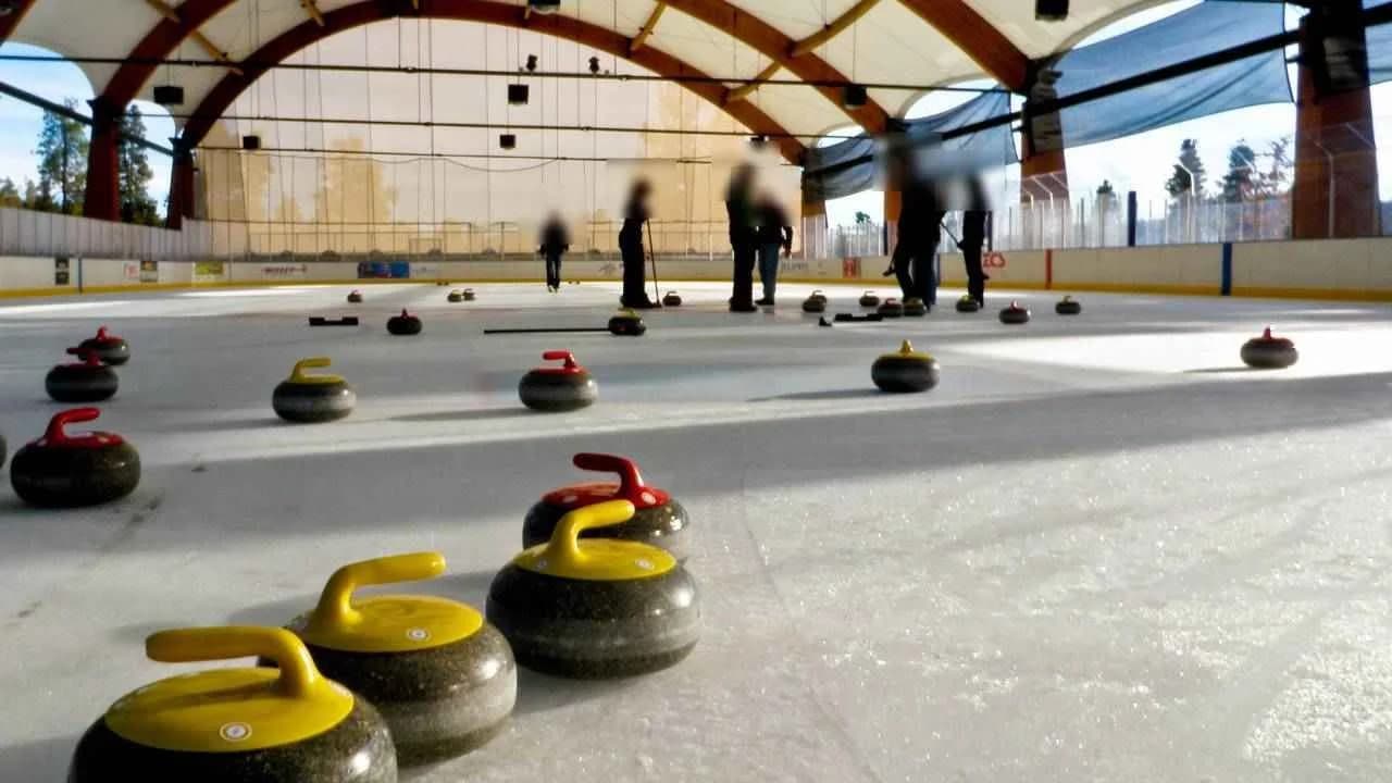 Curling stones on the ice