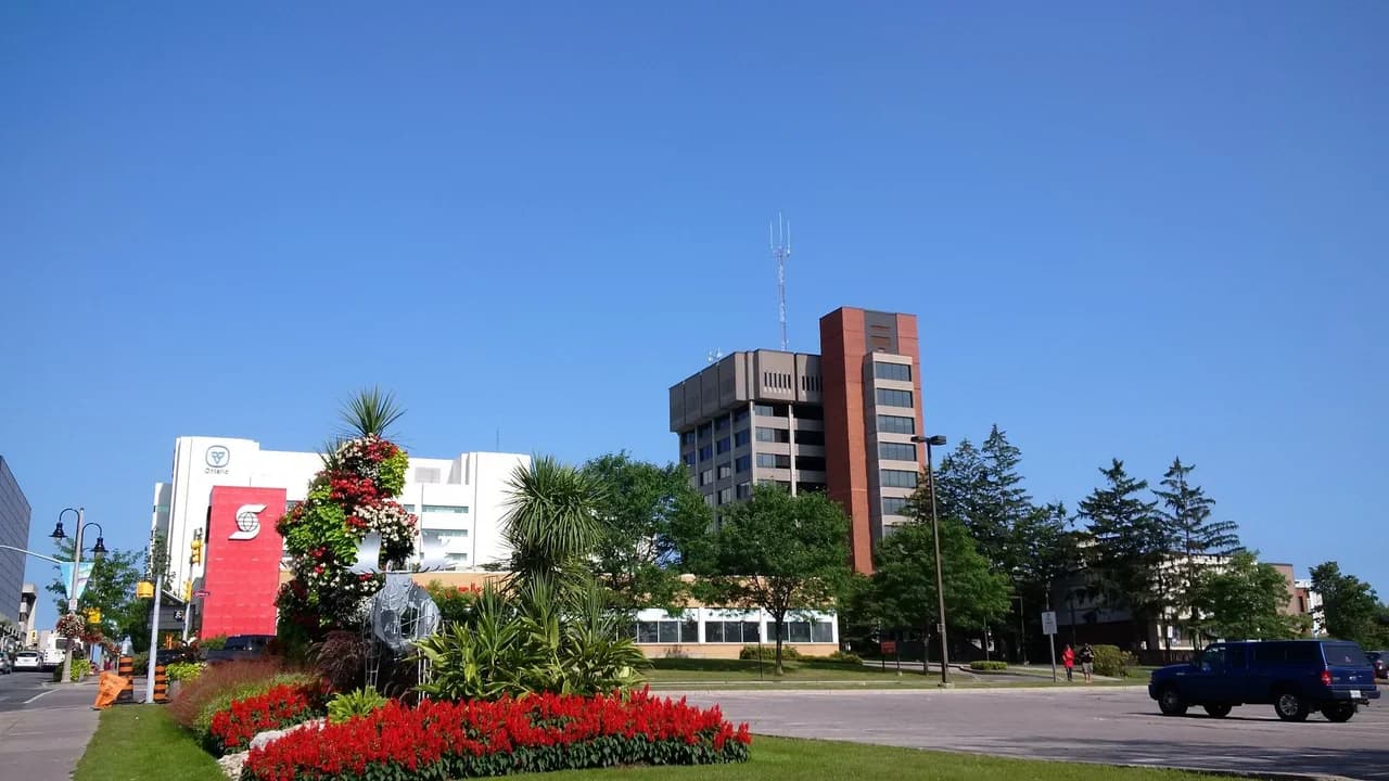 Oshawa City Hall exterior on a summer day; no people present. File photo.