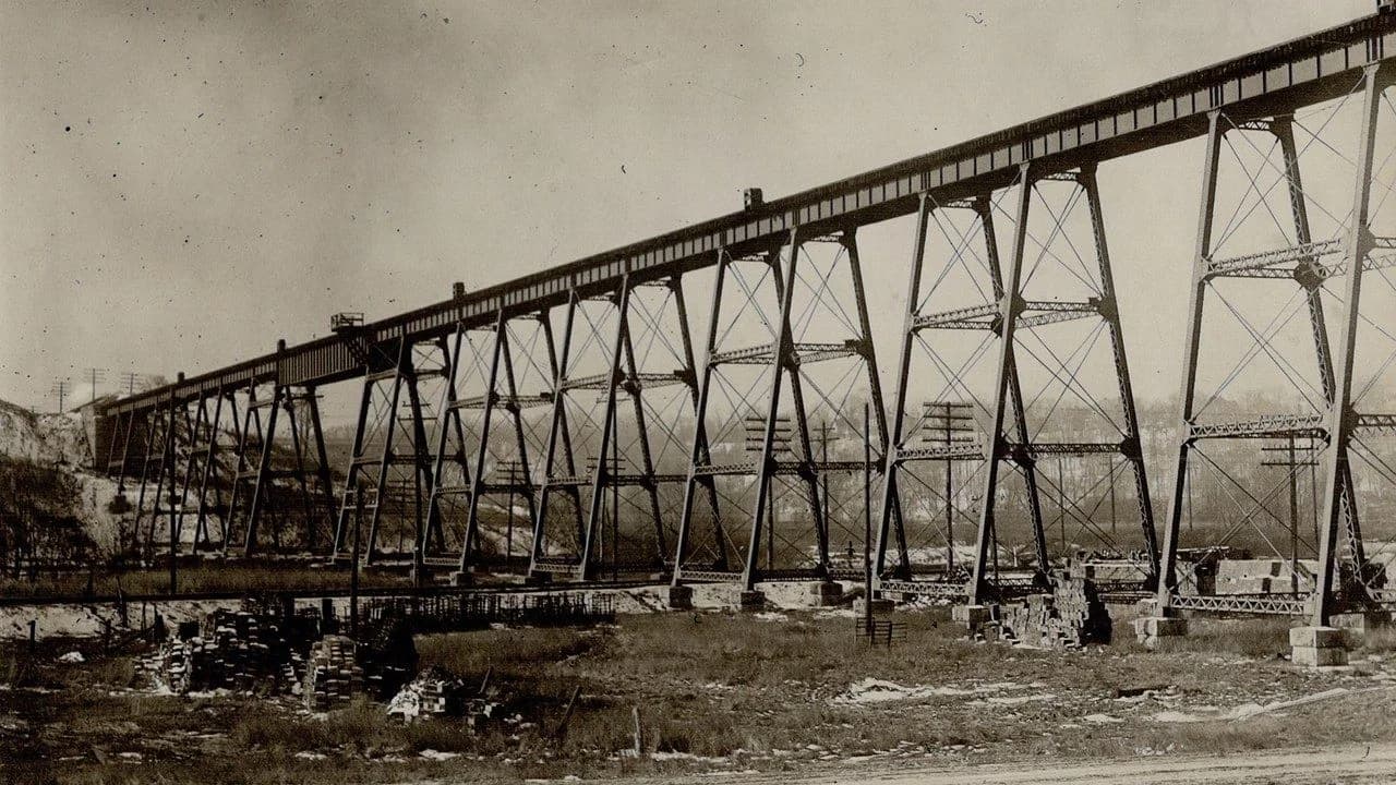 Historic black-and-white photograph of a Canadian Pacific Railway steel trestle bridge in Ontario; no people visible